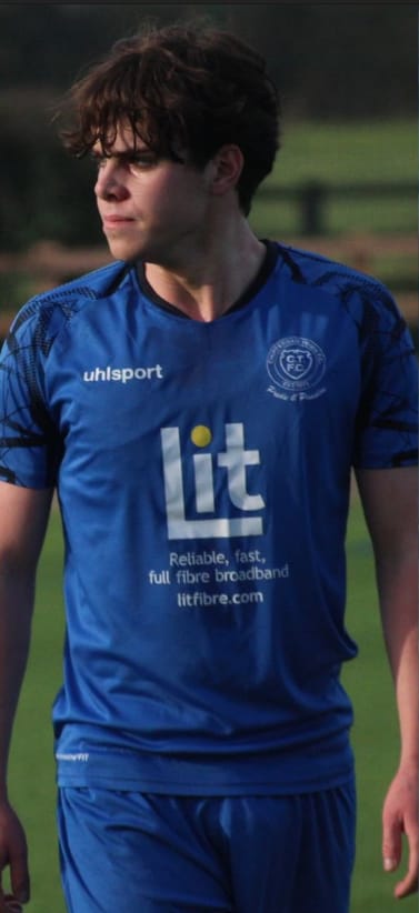 Idris Thomas-Jones in a blue match kit